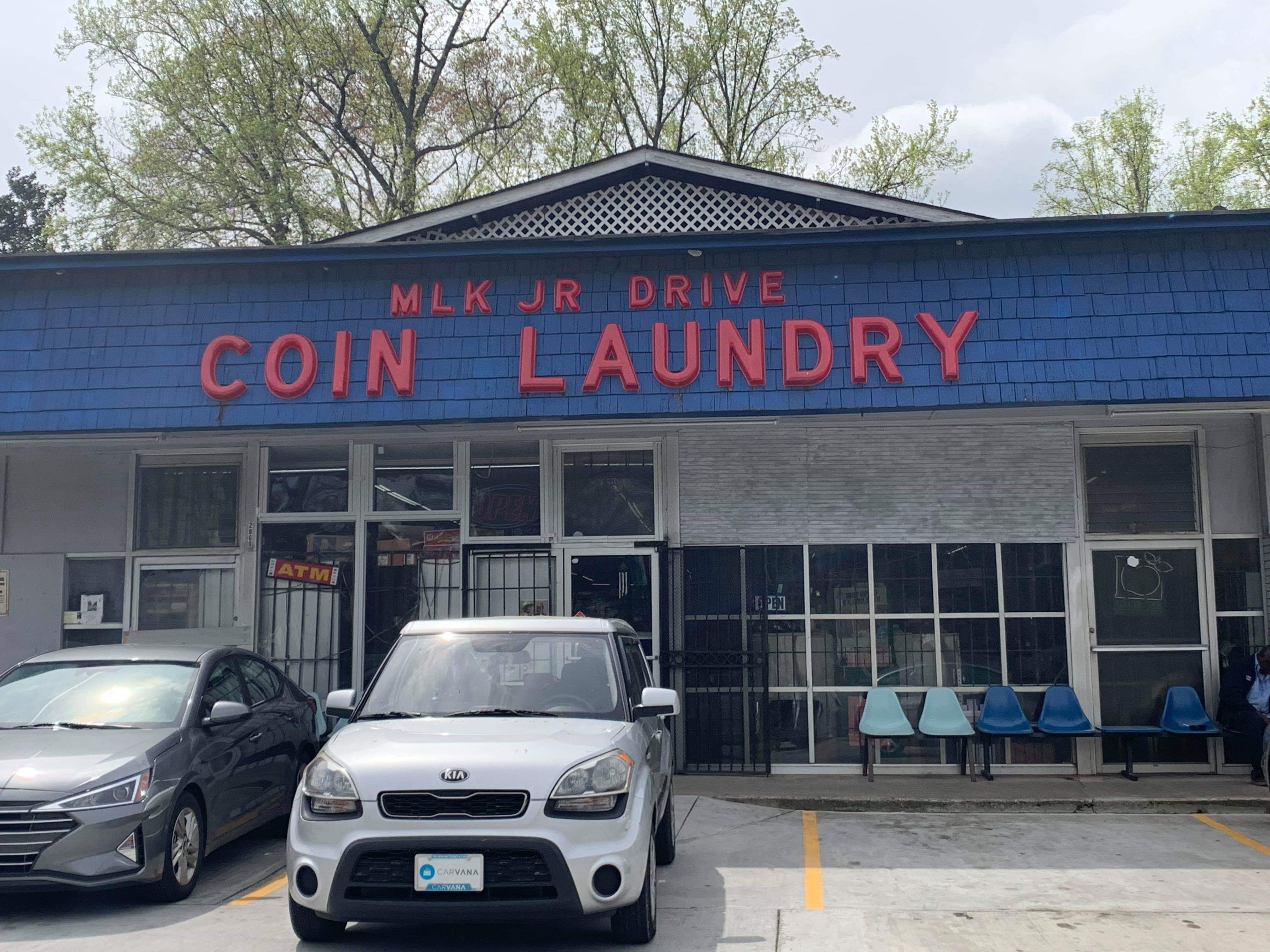 The MLK Jr Drive Coin Laundry storefront, one of the laundromats visited during the outreach